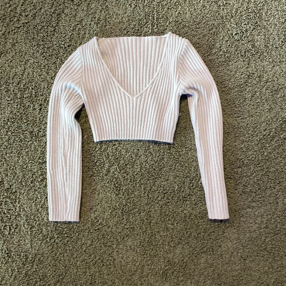 A bluish gray shirt and it’s a long sleeve + a super cute green ruffel top!